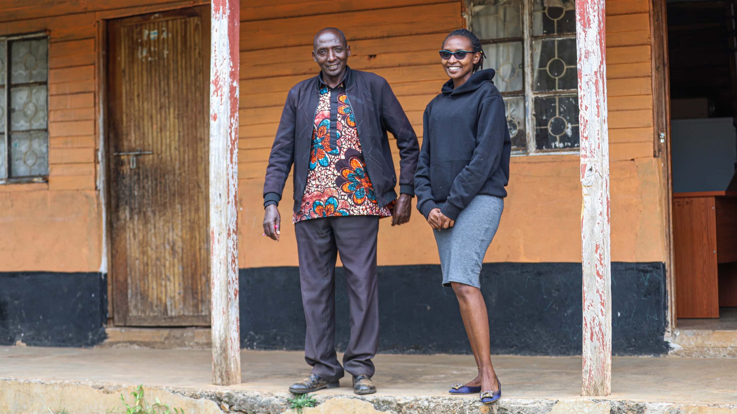 Ipas_IMG_6532_RS7519_ A portrait of Amos and Hellen Topisia outside the office.