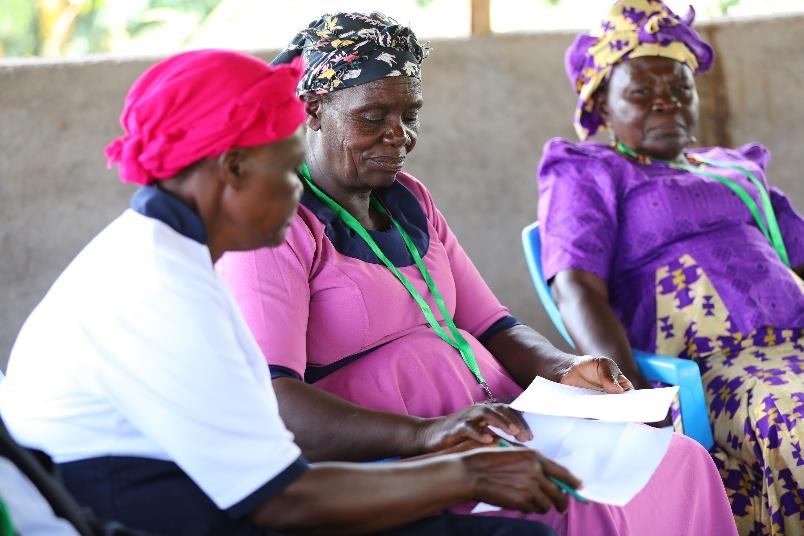 Women looking at a piece of paper