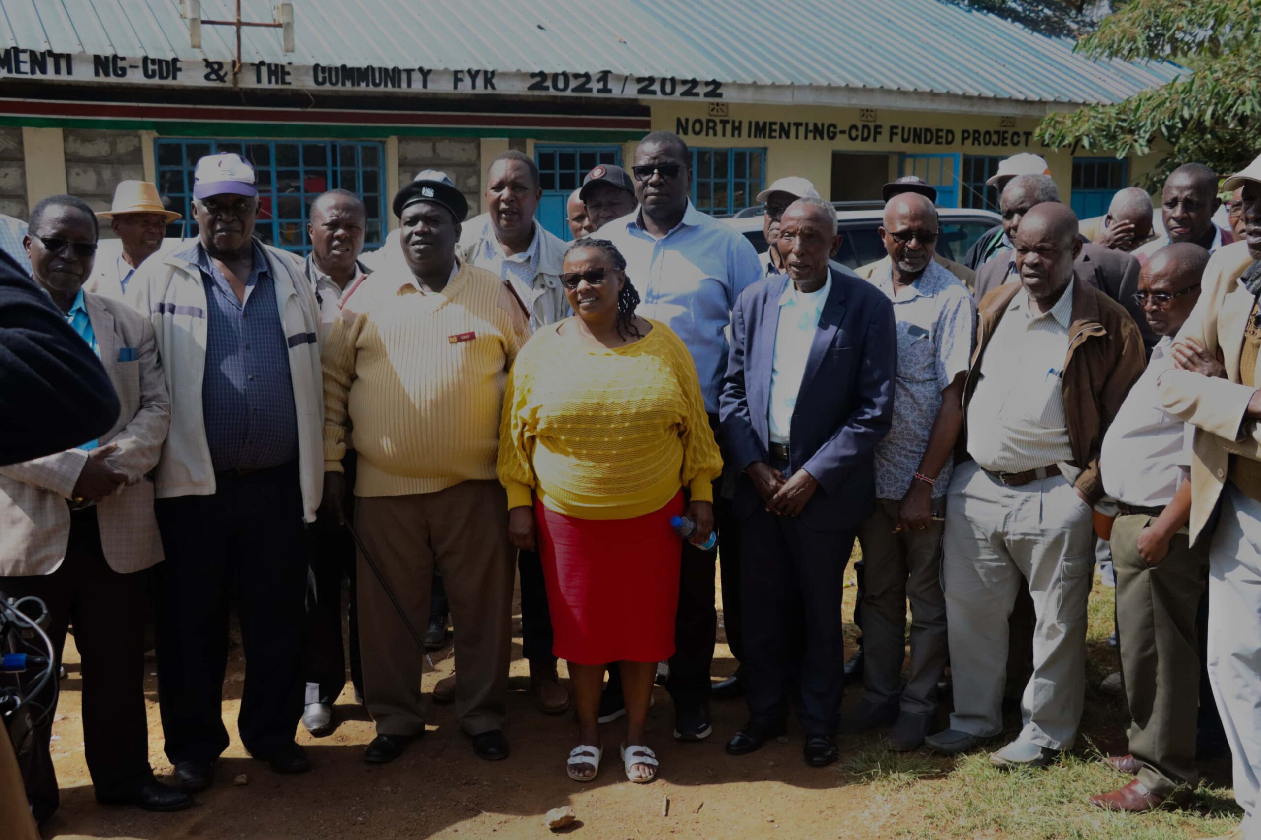 Group of individuals standing outside
