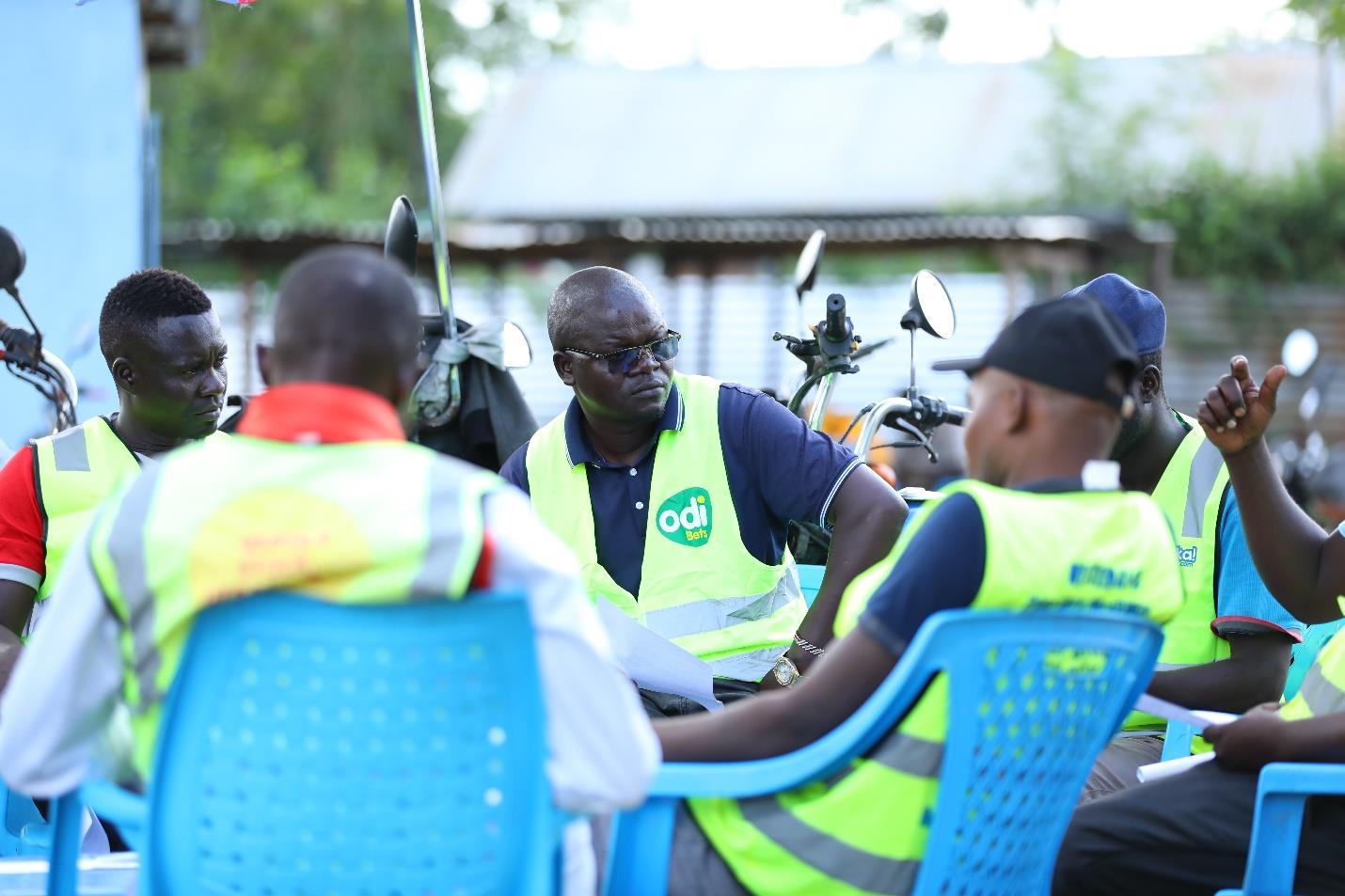 A meeting of motorcycle taxi operators in progress.